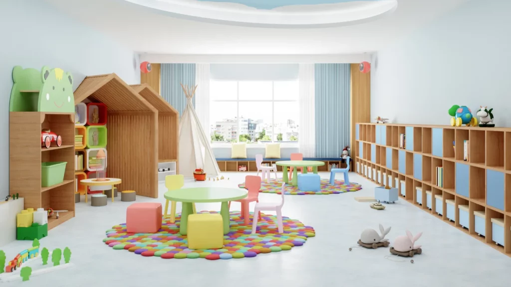 Sala de juegos infantil, con mobiliario y juguetes diseñados para niños, y una amplia ventana que permite la entrada de luz natural.